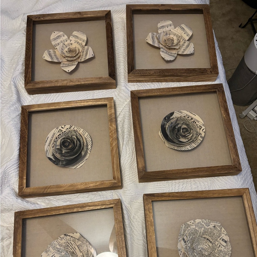 Wall hangings medium oak 11x11 each. Like new.